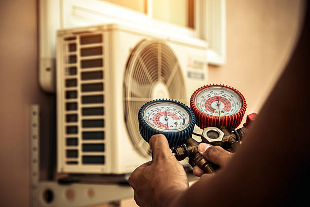 Professional Air Conditioning Service technician working in Thiells, NY